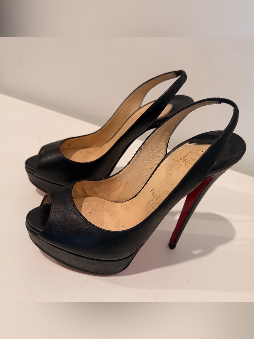 Christian Louboutin Black Leather Peep-Toe Slingback Pumps with Red Soles